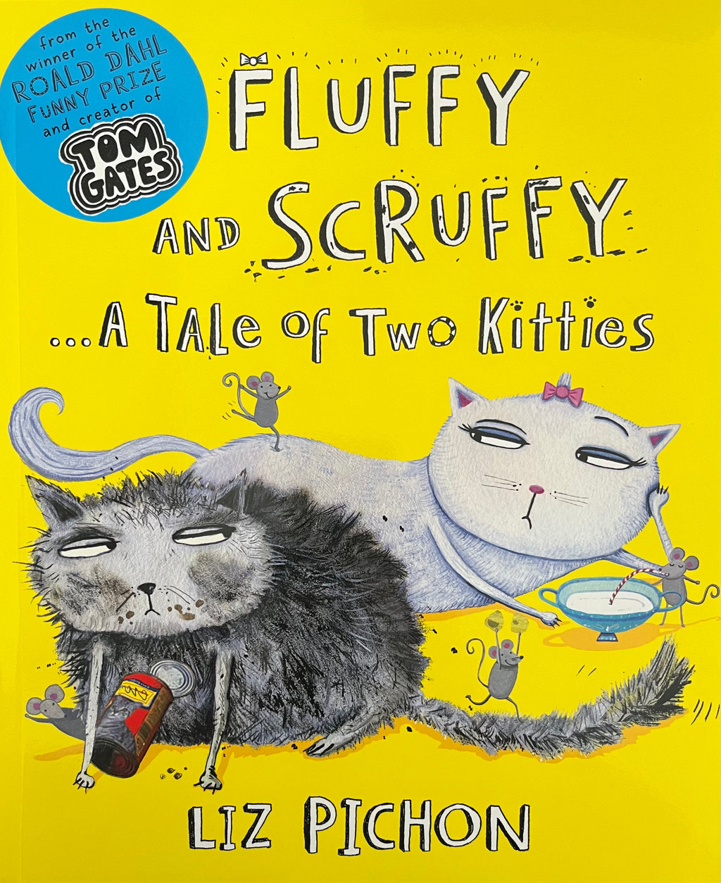 Fluffy and Scruffy.... A tale of Two Kitties